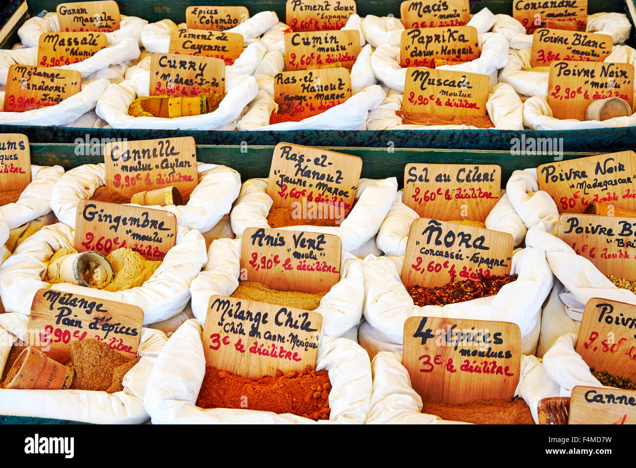 Street market stall display of spices in Objat, Correze, Limousin, France. Stock Photo