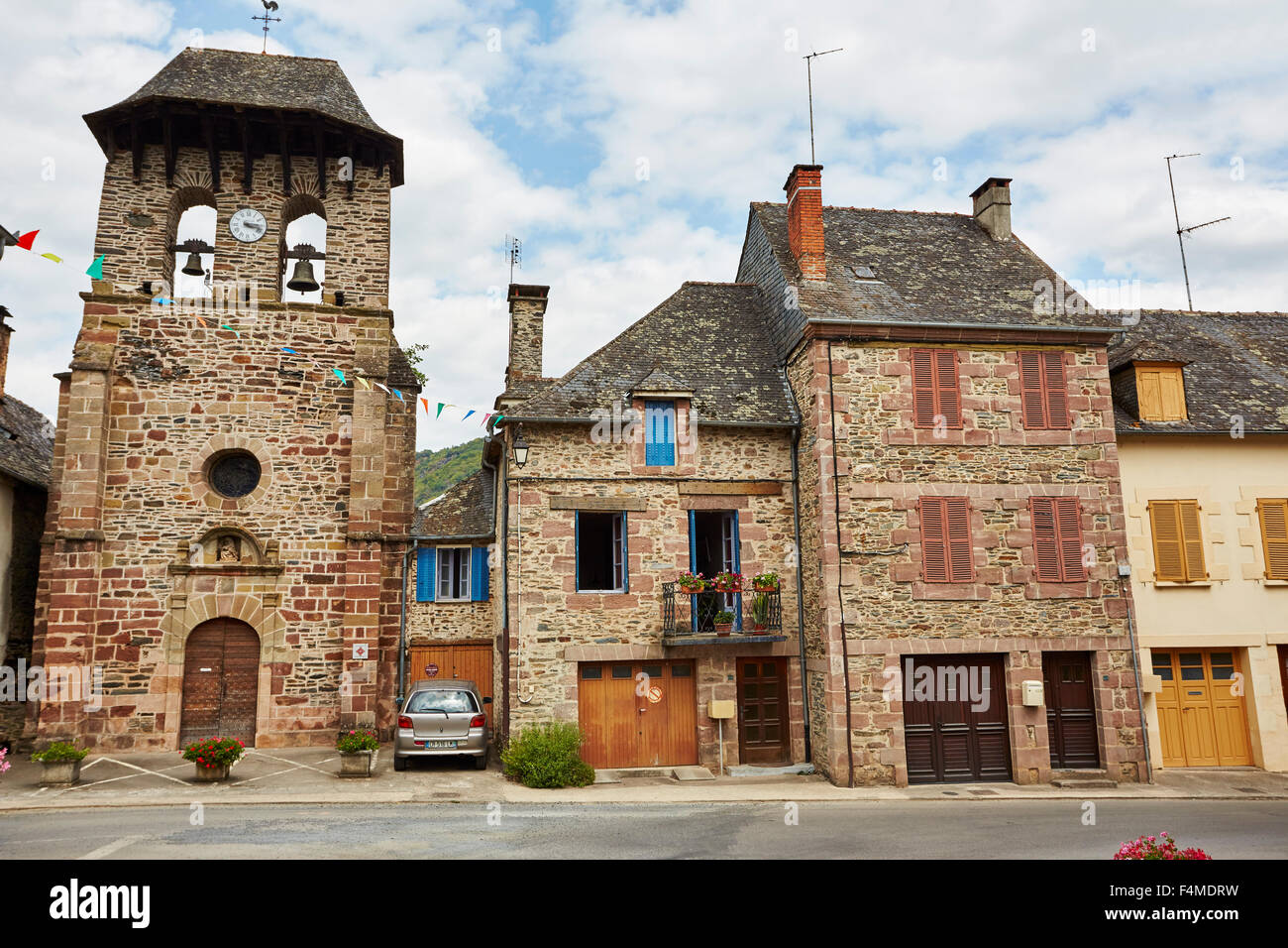 Church and neighboring buildings in Le Saillant, Correze, Limousin, France. Stock Photo