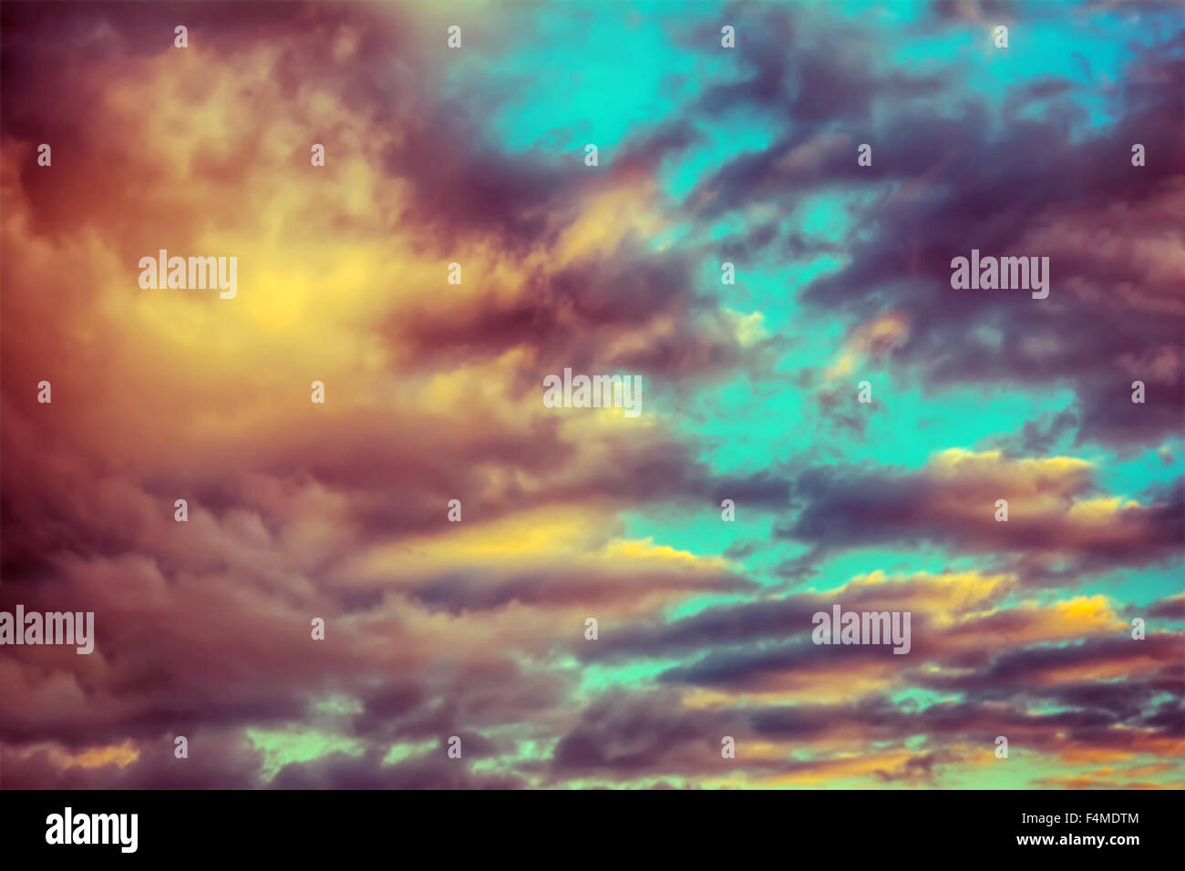 Dark stormy clouds in sunset light. Nature background Stock Photo - Alamy