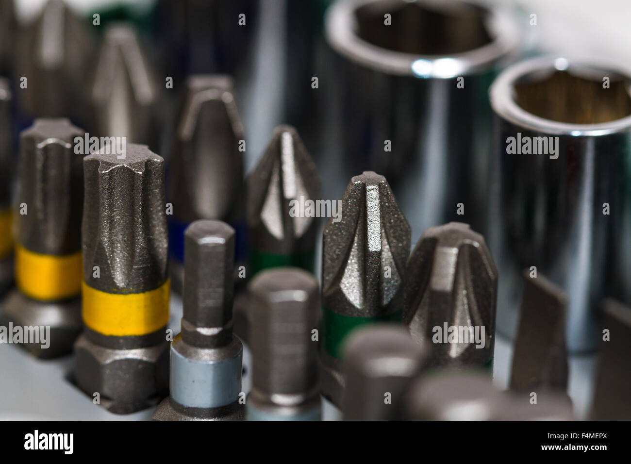 Metal working tools. Metalwork. Box, saw, spanner and others tools on white background. Stock Photo