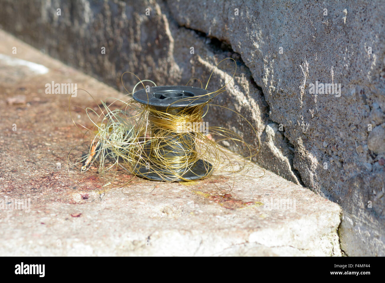 Tangled fishing line on reel Stock Photo Alamy