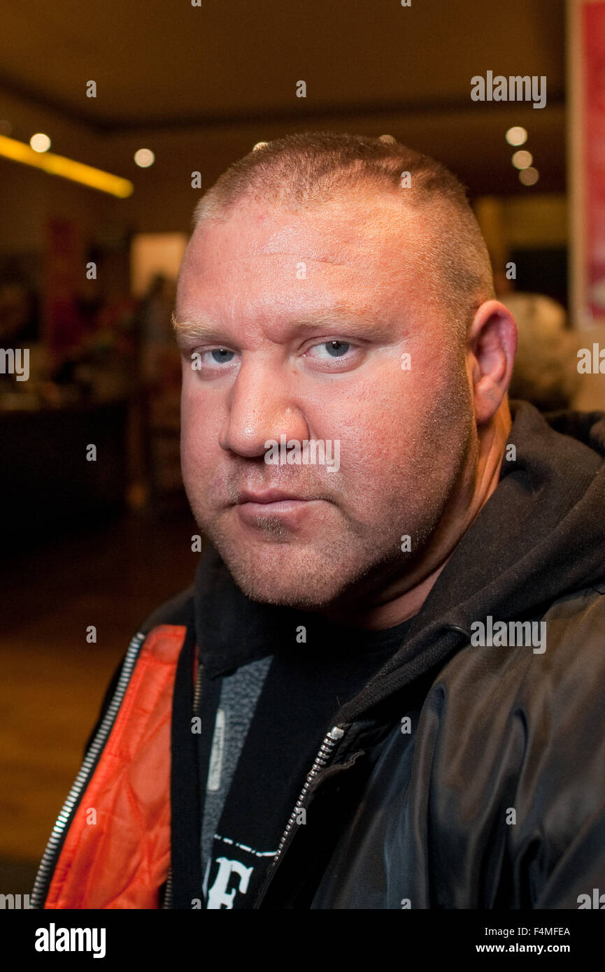 Berlin, Germany. 19th Oct, 2015. Guantanamo torture victim Murat Kurnaz sits in the lobby of a cinema in Berlin, Germany, 19 October 2015. The former inmate of the Guantanamo Bay detention camp met with representatives of Amnesty International and Human Rights Watch at this location to discuss further proceedings in his and other similar cases and took part in a panel discussion. Photo: Klaus-Dietmar Gabbert/dpa/Alamy Live News Stock Photo