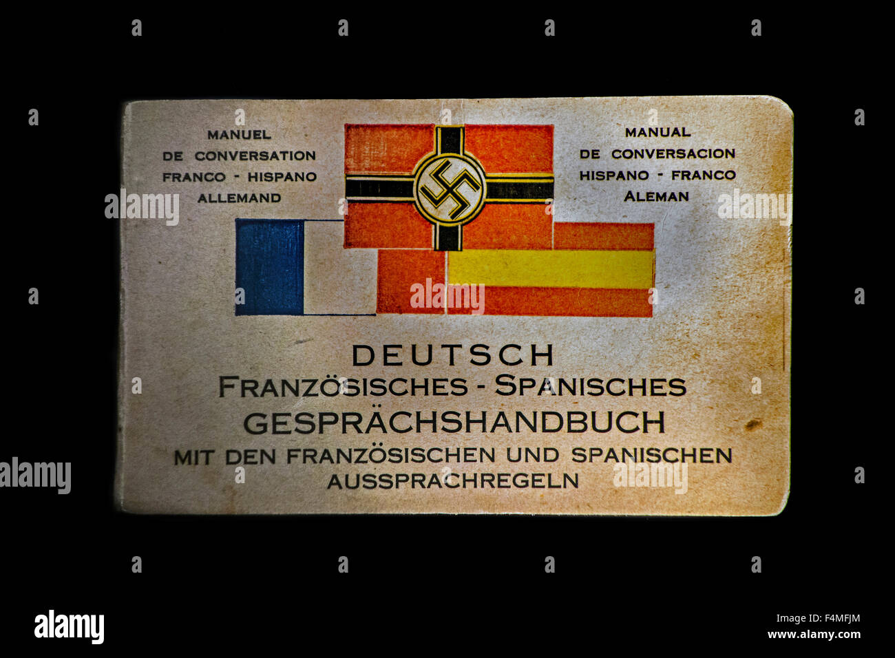 Multilingual dictionary with swastika symbol translating French, Spanish and German from Nazi Germany for Second World War soldiers abroad Stock Photo