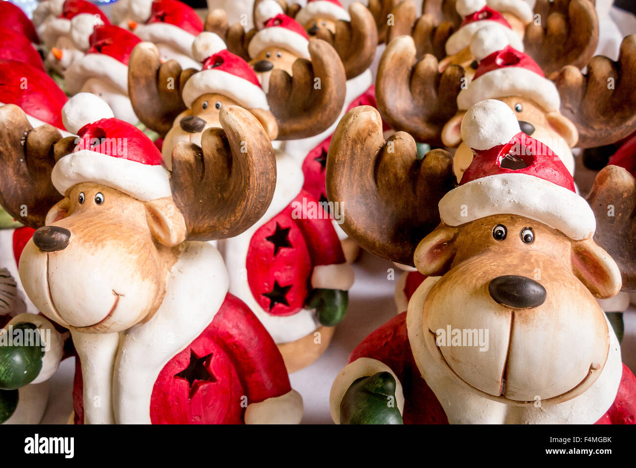 Christmas ornaments lined up for sale at a garden centre Stock Photo