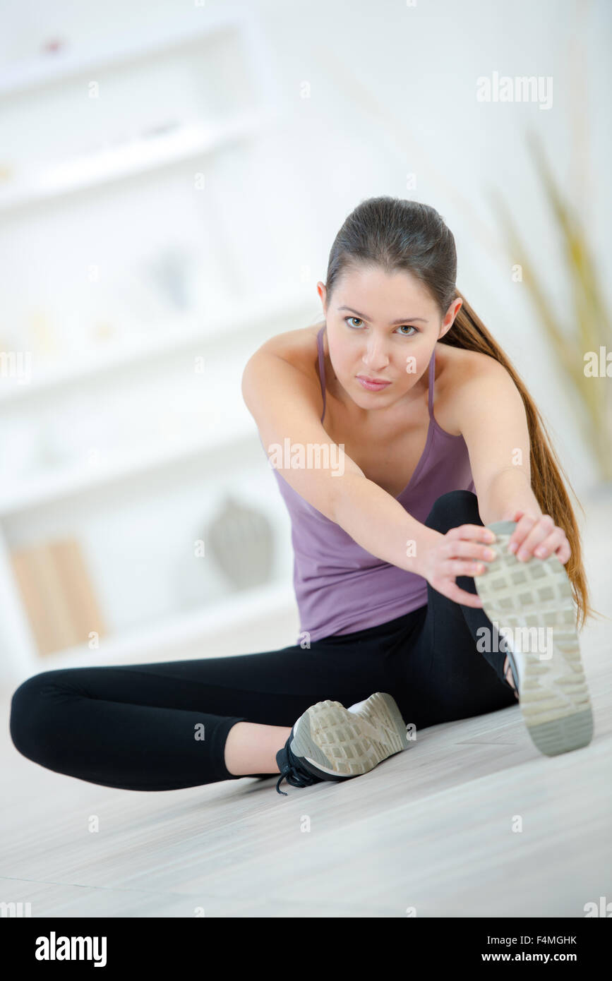 Woman stretching before exercise Stock Photo