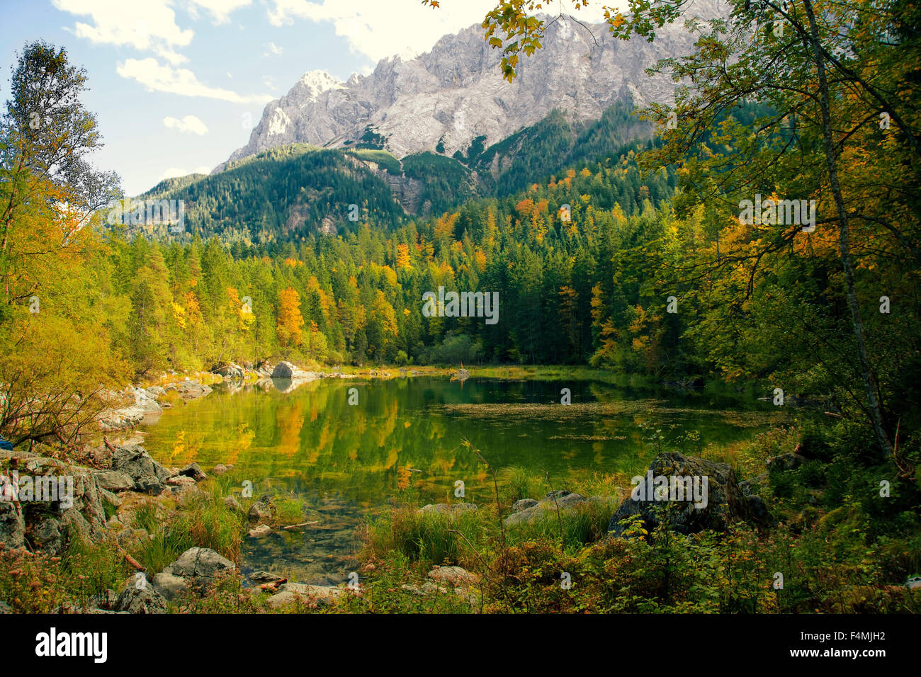 Peaceful little lake at the foot of the Bavarian Alps, Germany. Stock Photo