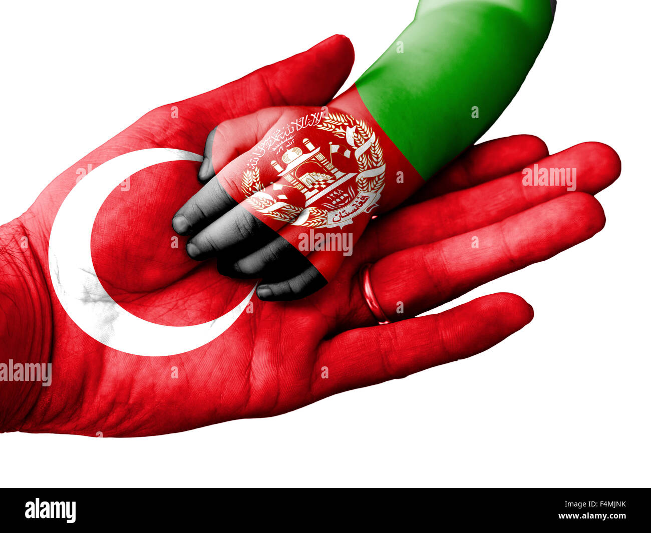 Flag of Turkey overlaid the hand of an adult man holding a baby hand with the flag of Afghanistan overprinted Stock Photo