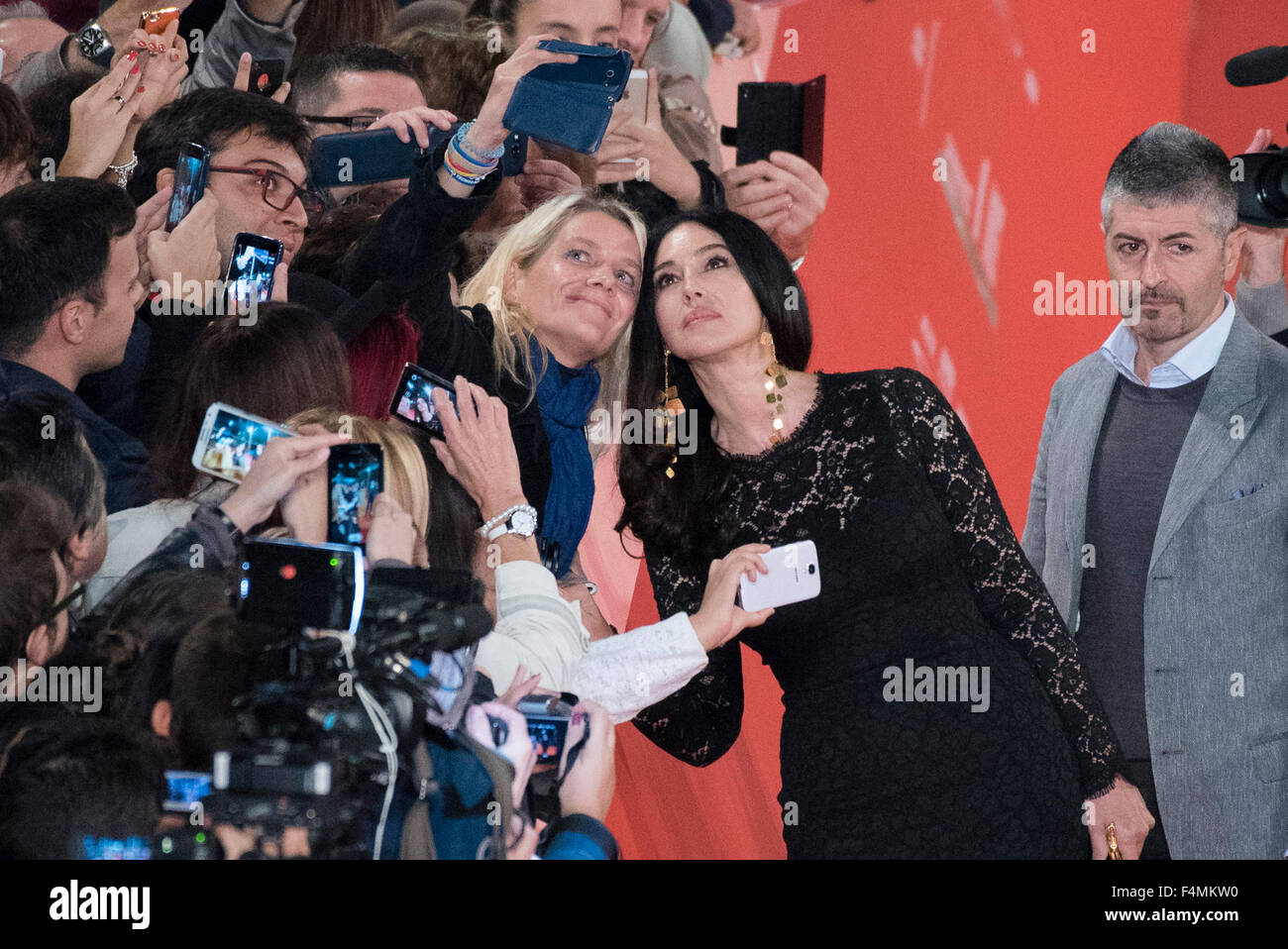 Rome, Italy. 20th Oct, 2015. Monica Bellucci for a selfie with a fan during the red carpet for 'Ville-Marie' during the 10th Rome Film Fest on October 20, 2015 in Rome, Italy. Credit:  Massimo Valicchia/Alamy Live News Stock Photo