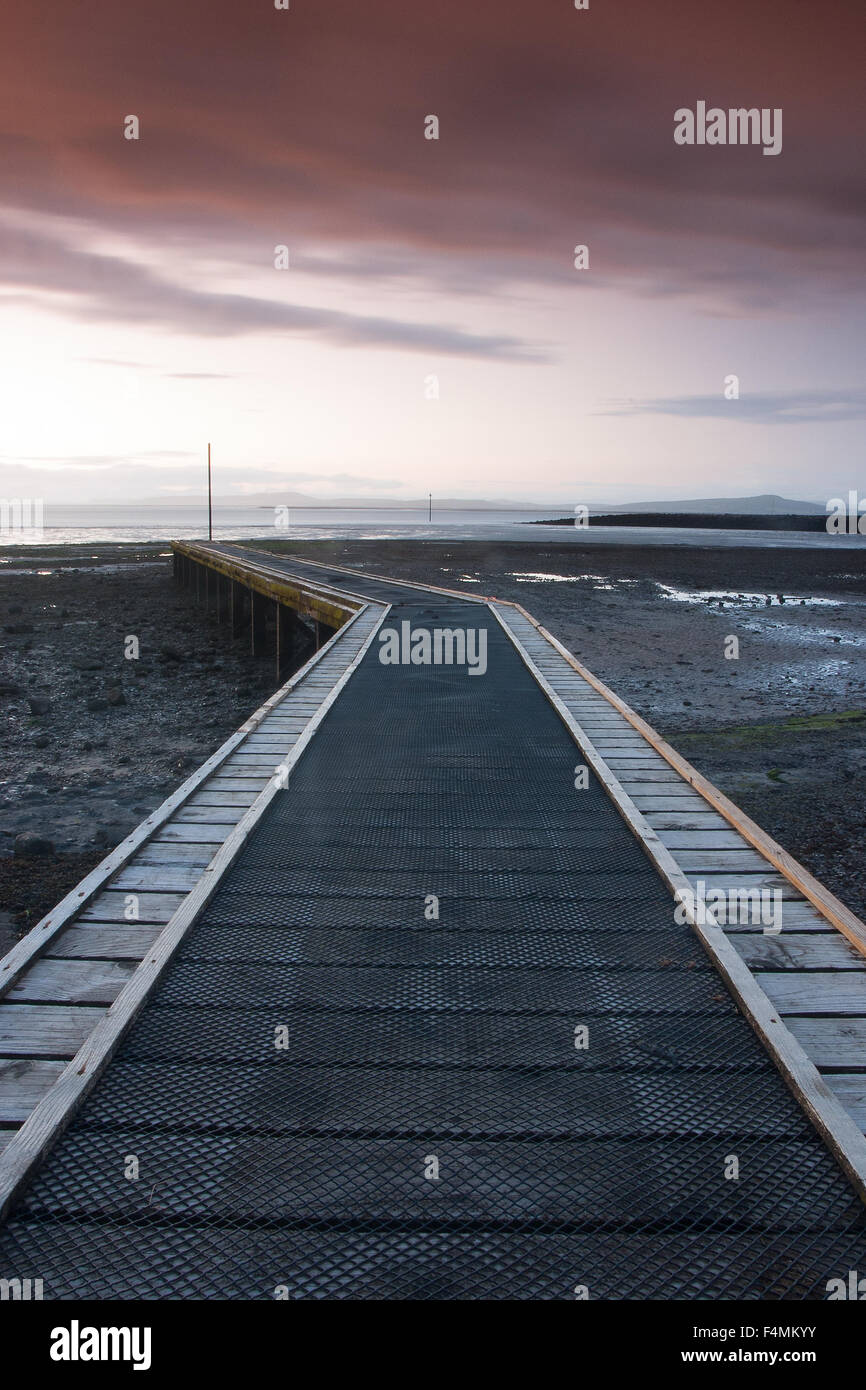 Sunset on the jetty in Morecambe Bay, Morecambe, Great Britain Stock Photo