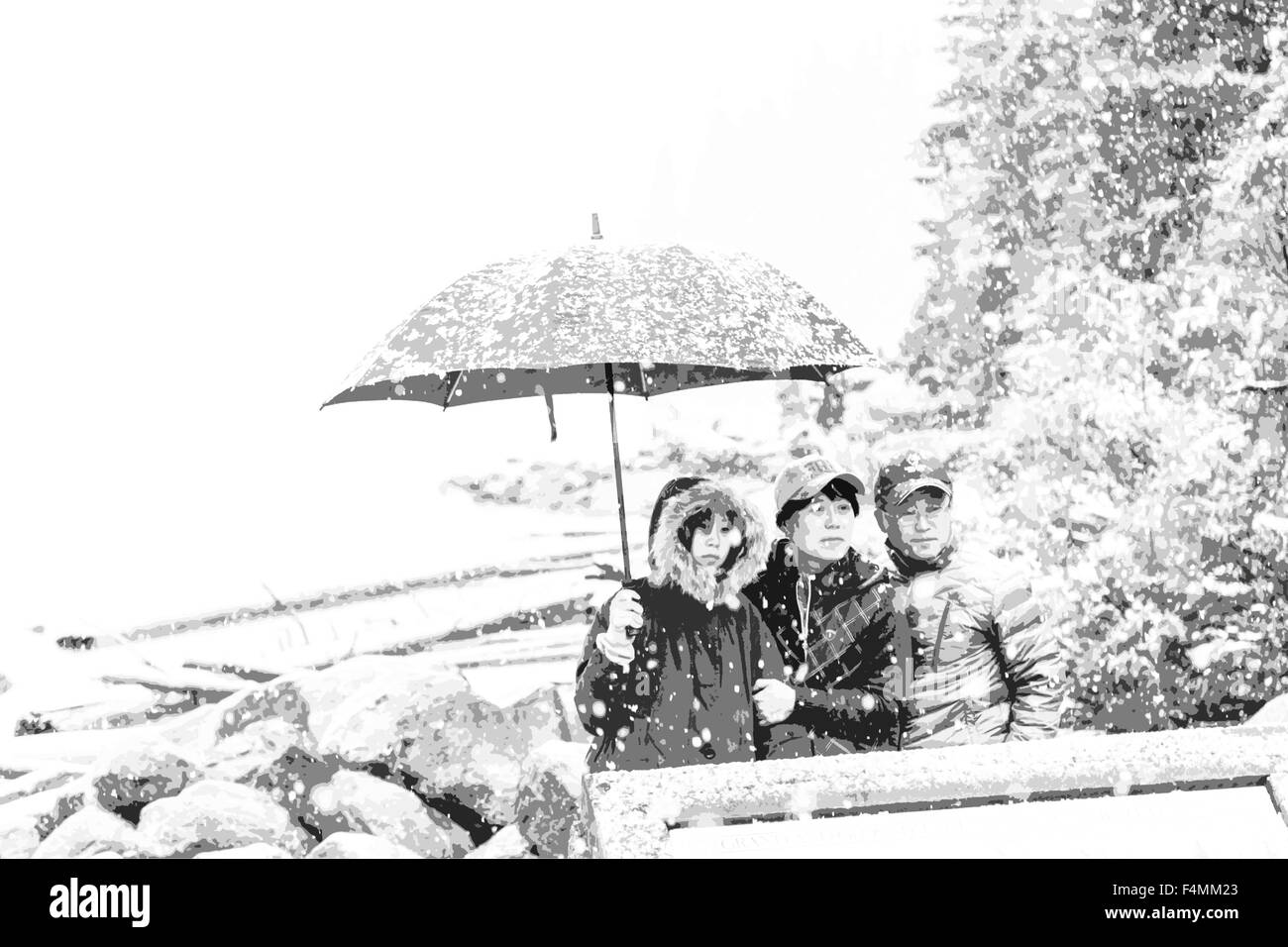 Snow in September and tourists shelter under an umbrella at Moraine Lake, Banff National Park, Rocky Mountains, Alberta, Canada. Stock Photo