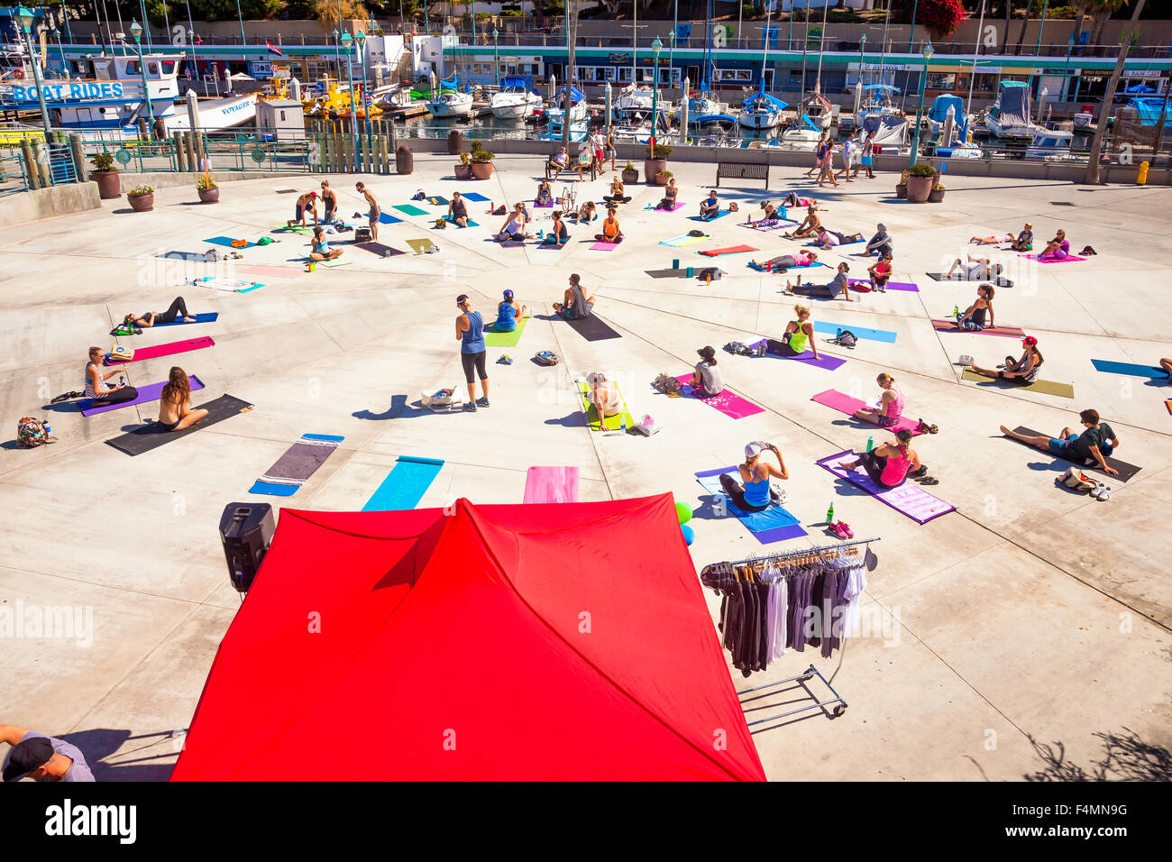 Large group of people performing Yoga at Redondo Beach;California;USA;America Stock Photo