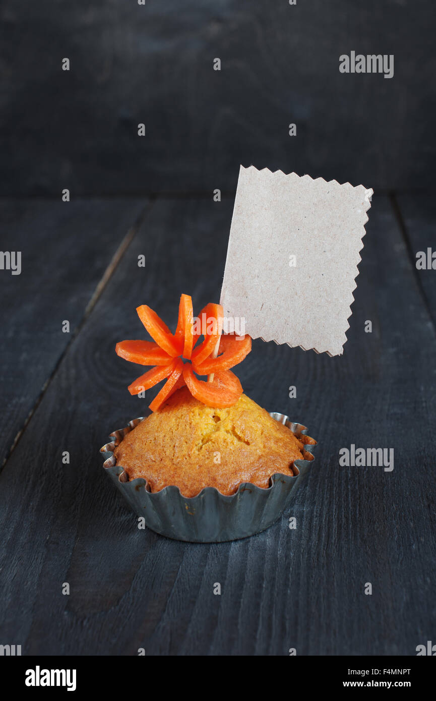 Cupcake with empty tag on the wooden table Stock Photo Alamy