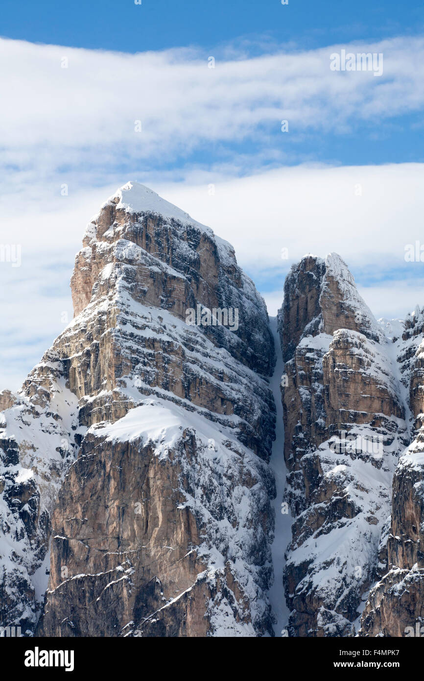 The massive cliff faces of The Sassongher above the village  Colfosco near Corvara Alta Badia Dolomites Italy Stock Photo