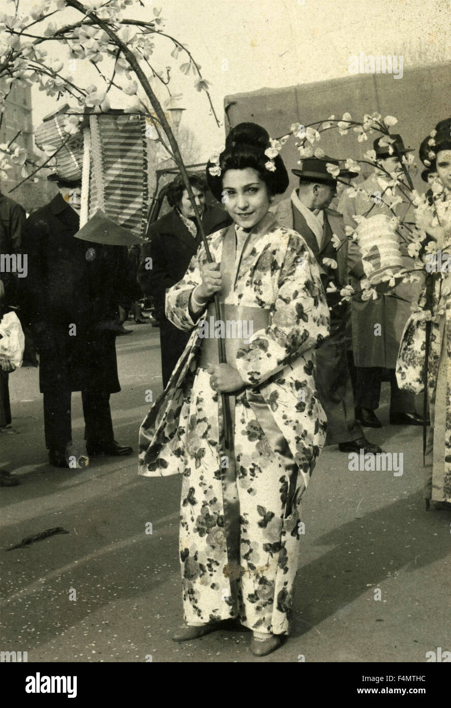 Japanese women in kimonos paraded with flowers Stock Photo