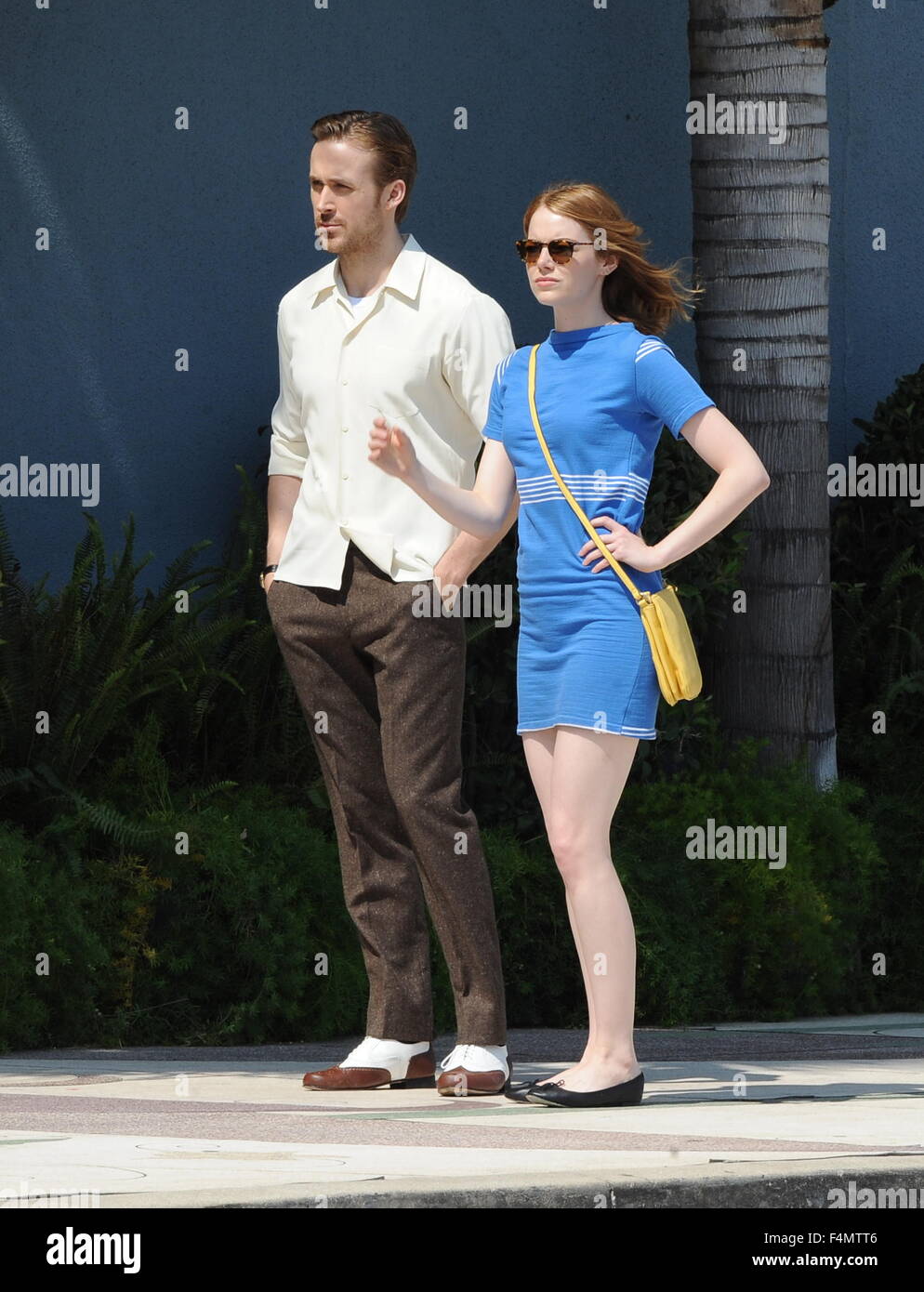Emma Stone and co star Ryan Gosling goofing around for a scene in their new movie "La La Land