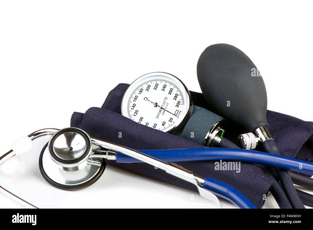 Stethoscope and blood pressure cuff on white background. Stock Photo