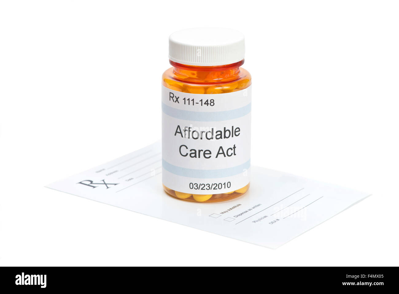Affordable Care Act pill bottle with prescription on white.  Label and all information contained therein is fictitious. Stock Photo