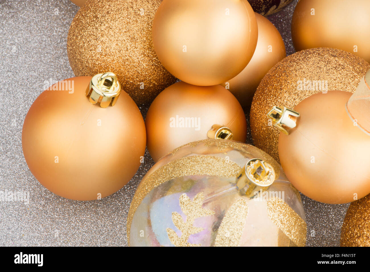 Golden christmas balls background Stock Photo - Alamy