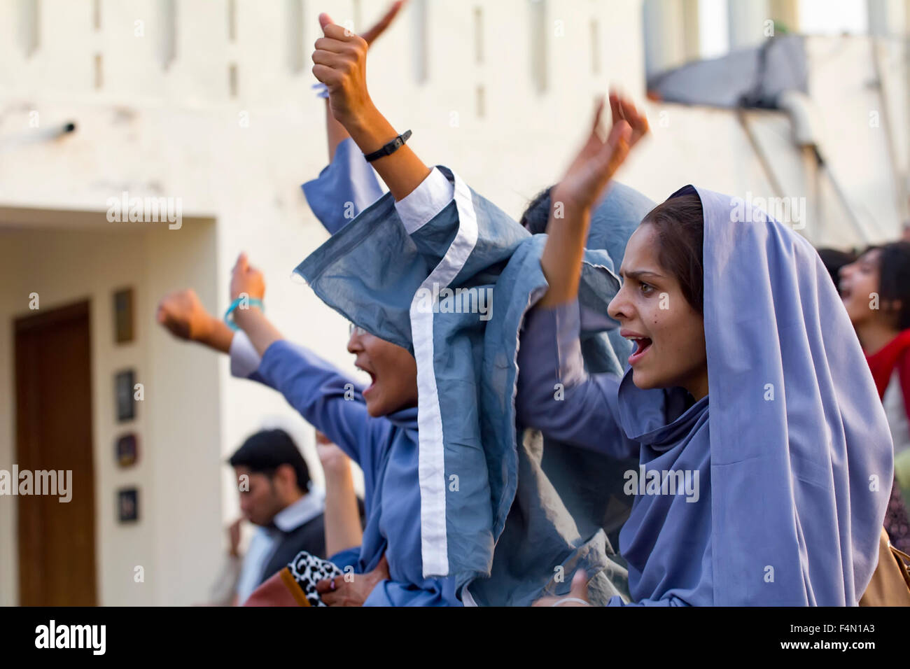 female muslim students protest at a political rally in Lahore Stock Photo