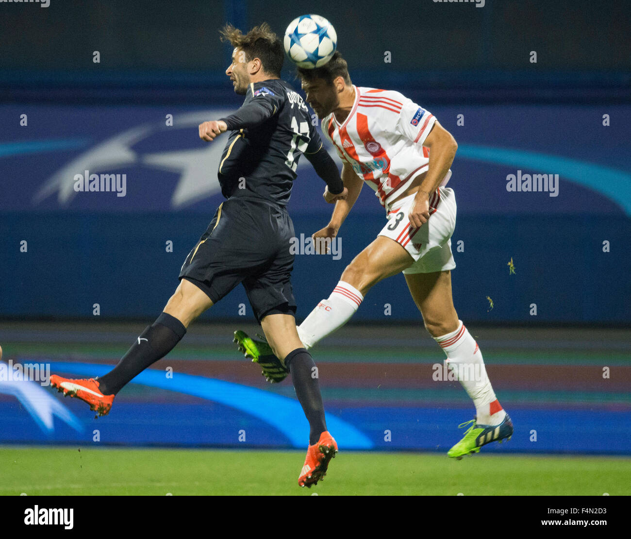 Zagreb, Croatia. 20th Oct, 2015. Alberto Botia (R) of Olympiacos vies with Goncalo Santos of Dinamo Zagreb during the UEFA Champions League Group F football match at Maksimir stadium in Zagreb, Croatia, on Oct. 20, 2015. Olympiacos won 1-0. Credit:  Miso Lisanin/Xinhua/Alamy Live News Stock Photo