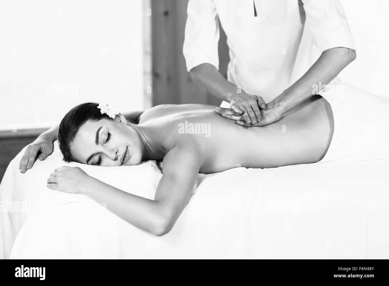 Woman enjoying massage. Stock Photo