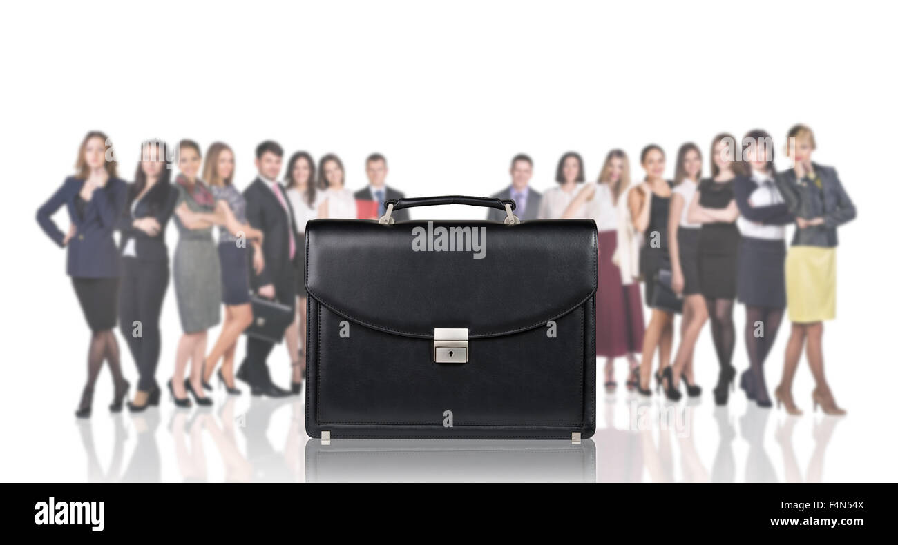 Black briefcase foreground and business peole Stock Photo