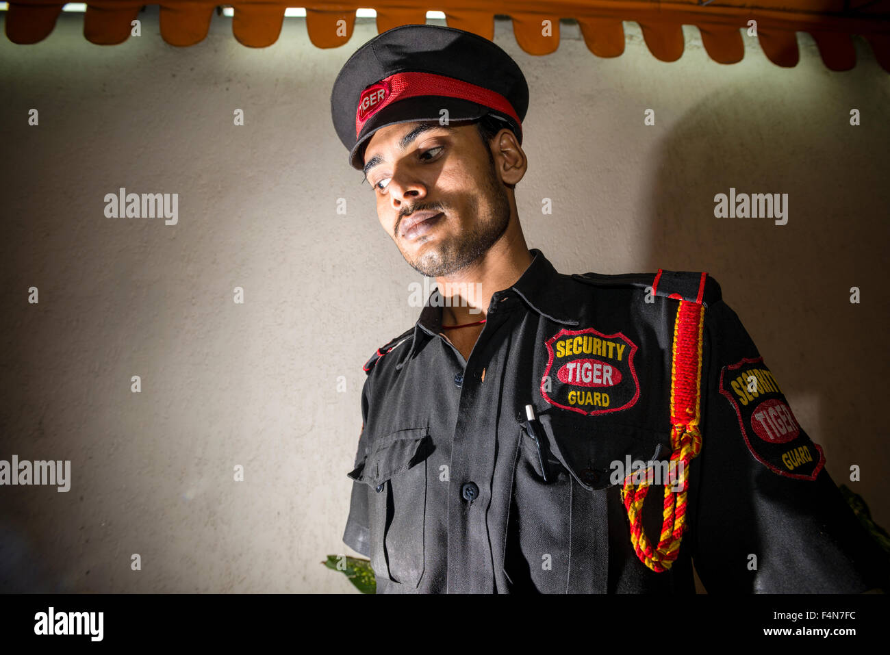 A portrait of one of the guards taking care of the very luxurios and expensive Taj Mahal Palace Hotel in the suburb Colaba Stock Photo