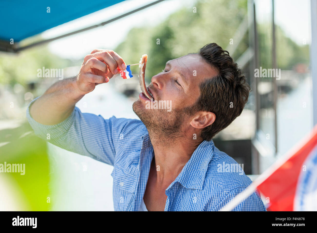 Man eating matjes herring hires stock photography and images Alamy