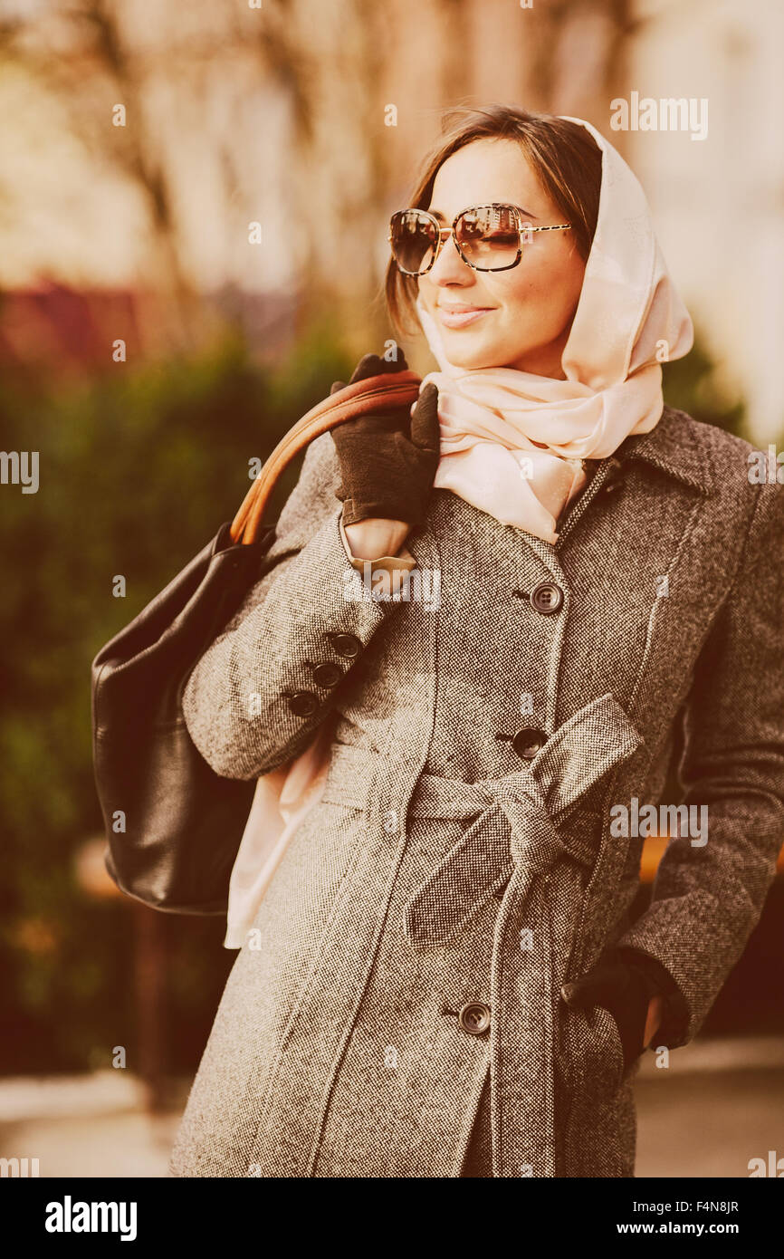 Happy young beautiful girl posing in the park Stock Photo - Alamy