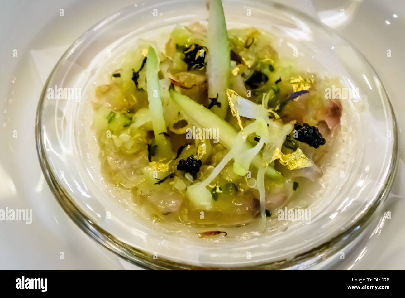 Sea Bass Carpaccio with Caviar and Green Apple Powder. Stock Photo