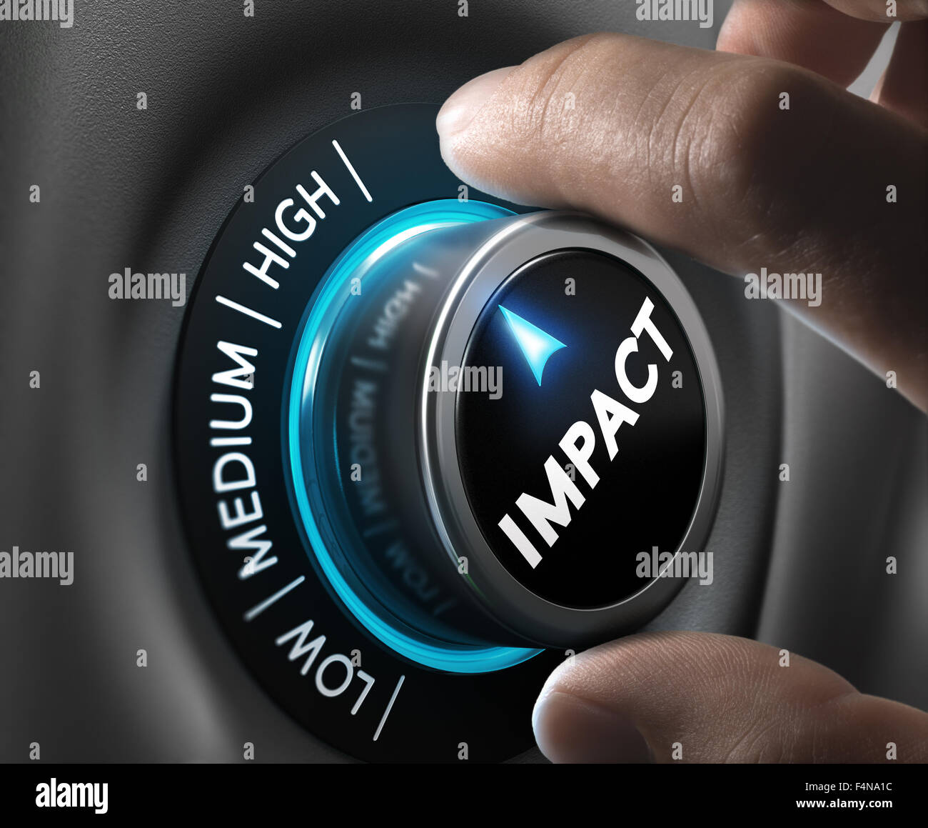 Man hand turning a knob in the highest position,  Concept image for illustration of high impact communication and advertising ca Stock Photo