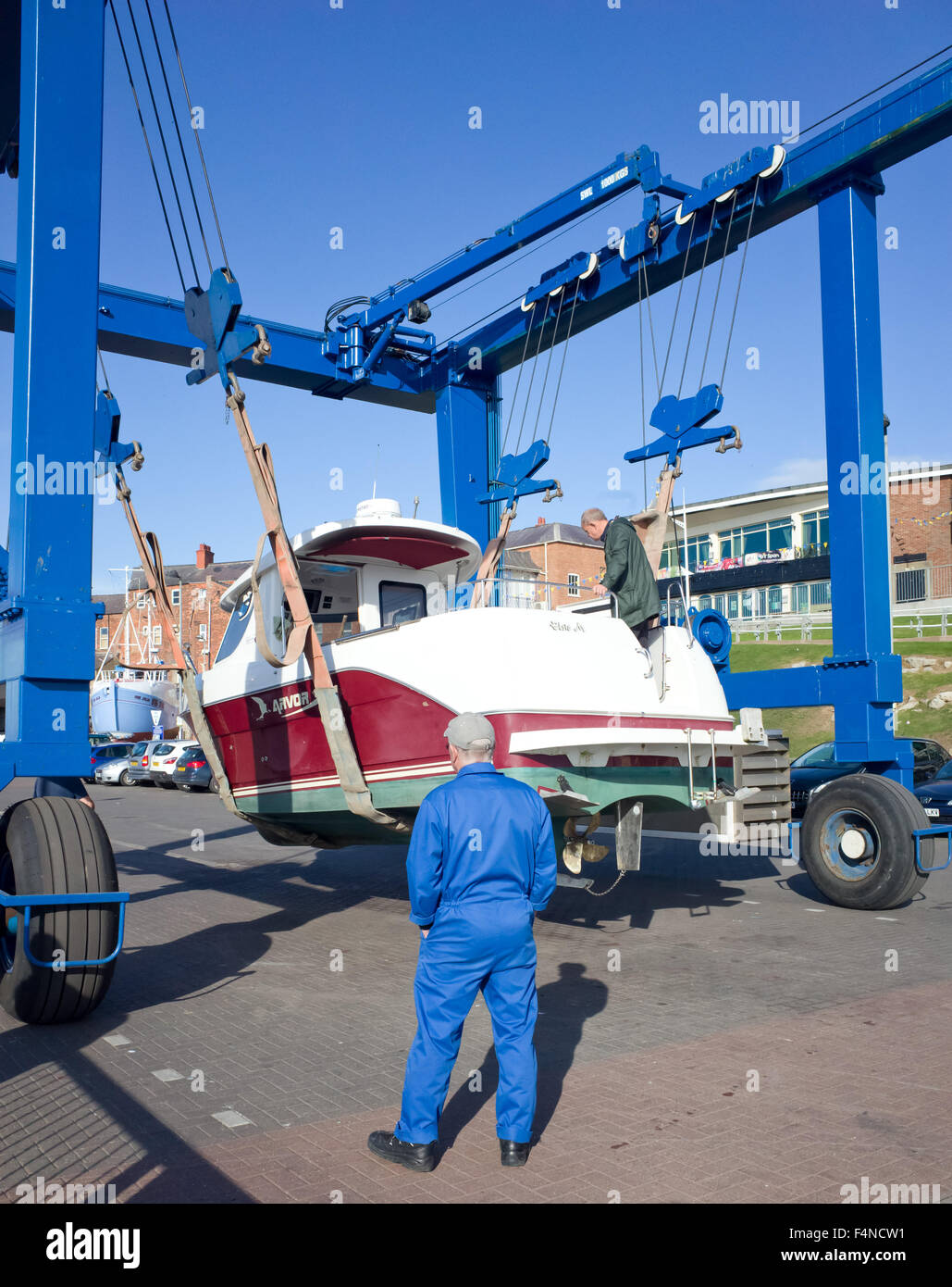 Crane lifting small boat hi-res stock photography and images - Alamy