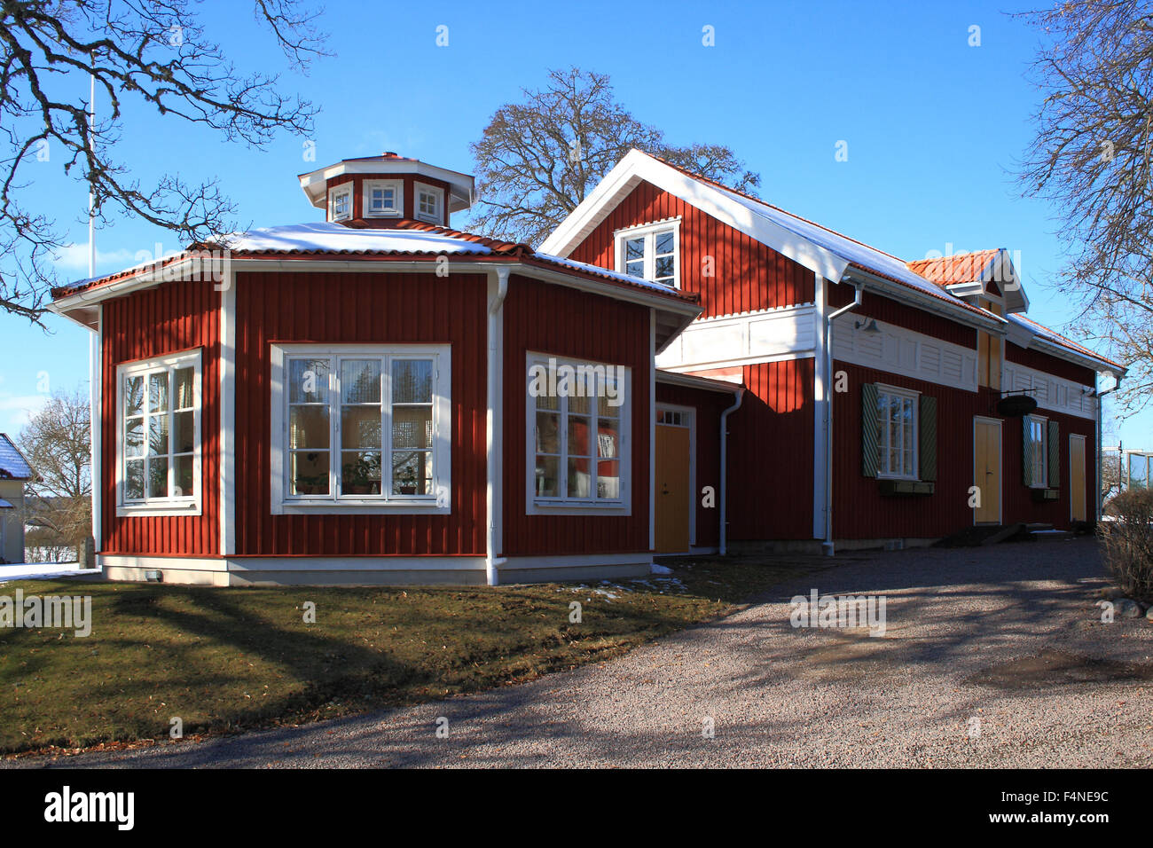 Swedish red houses, is the typical deep red colour in the wooden cottages, found all over the Swedish countryside. Stock Photo