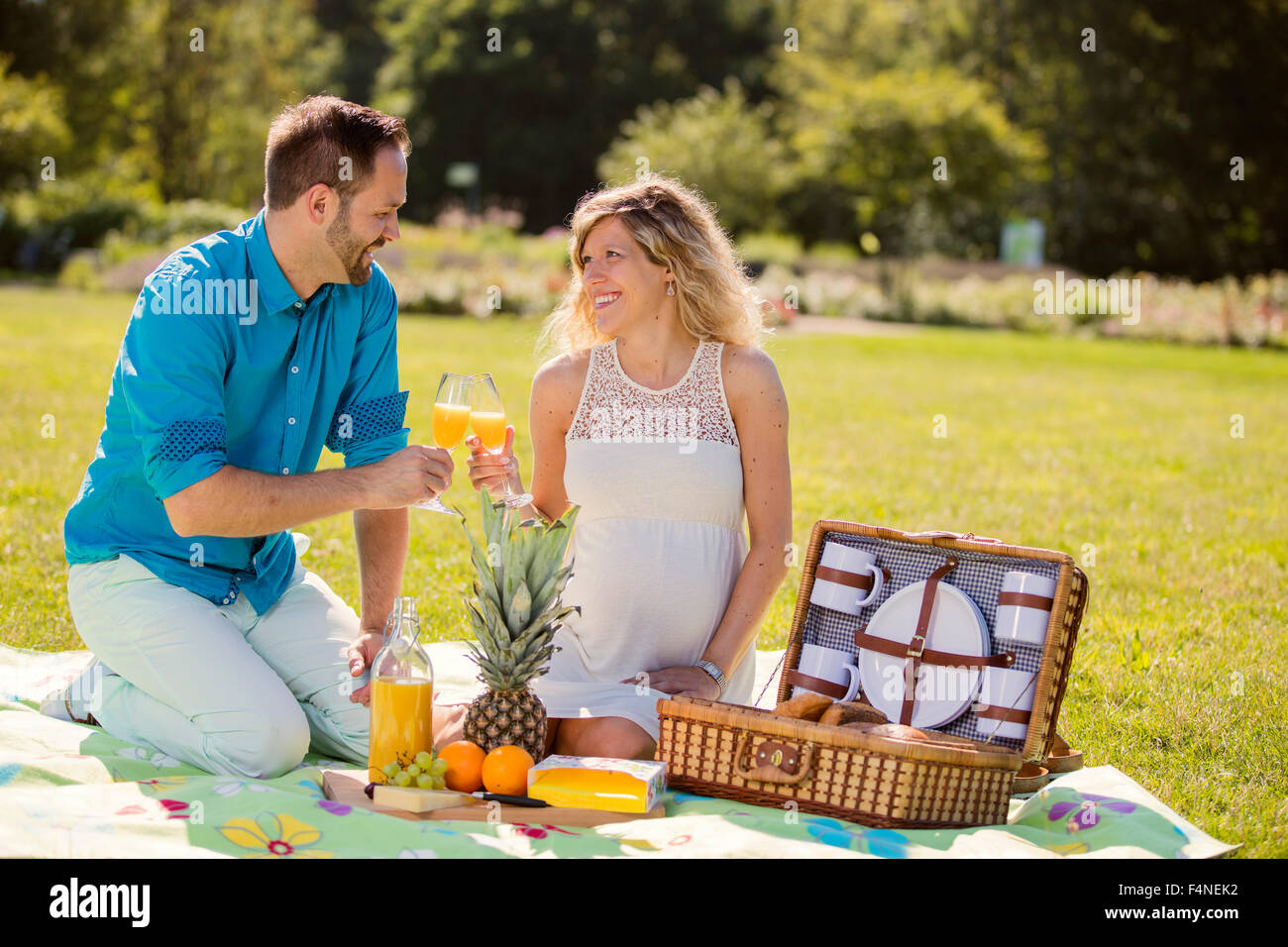 Pregnant couple having picnic hi-res stock photography and images - Alamy