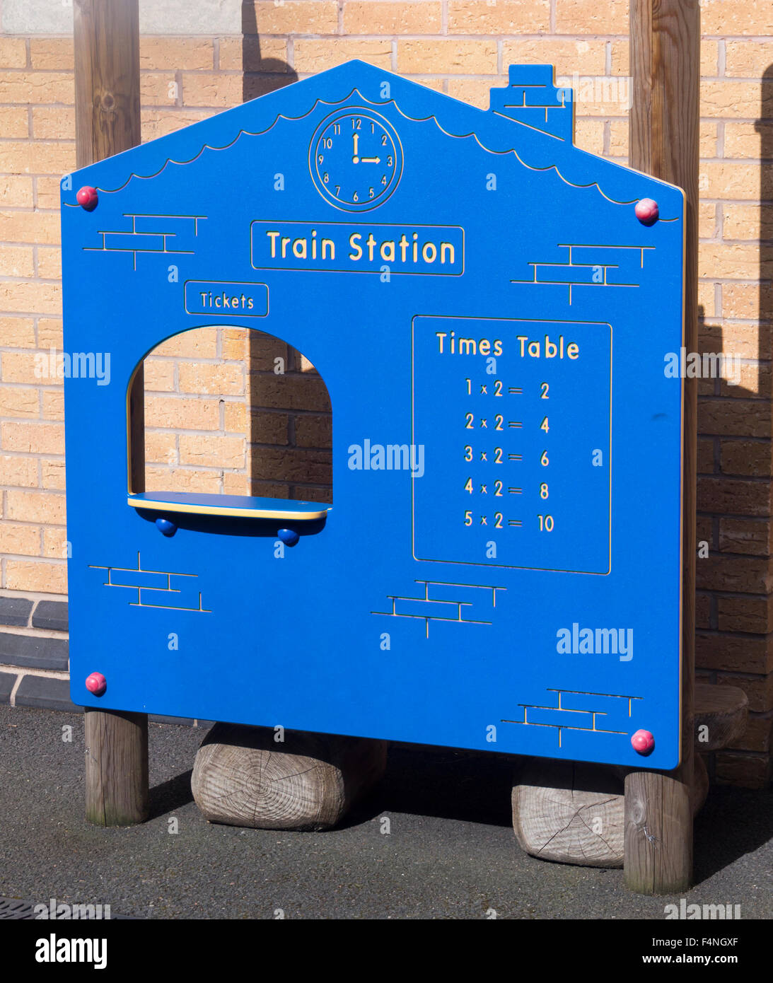 Childrens' play railway station ticket office playground equipment on the station platform at