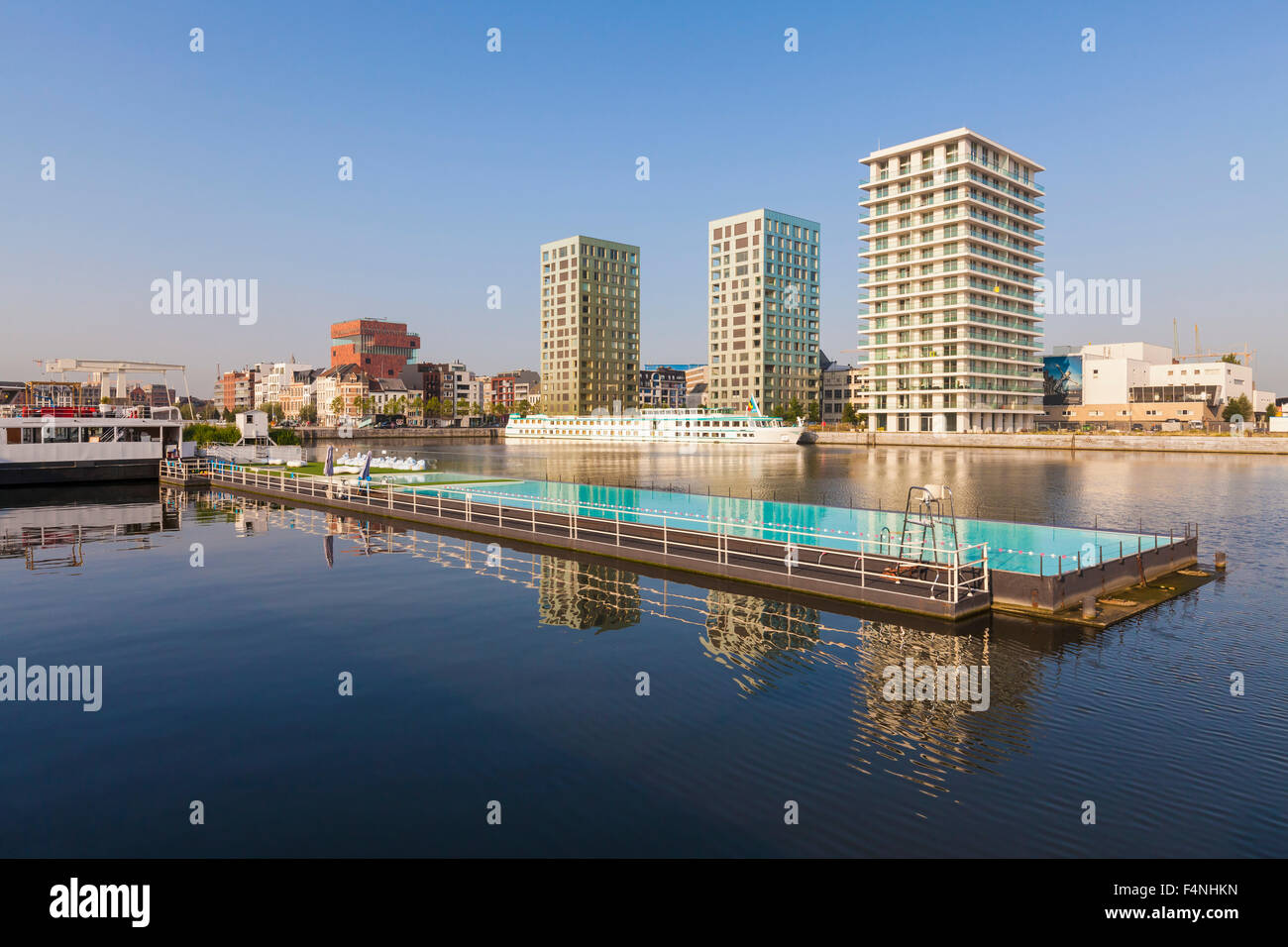 Belgium, Flanders, Antwerp, former dock area, swimming swimming pool, apartment buildings Stock Photo