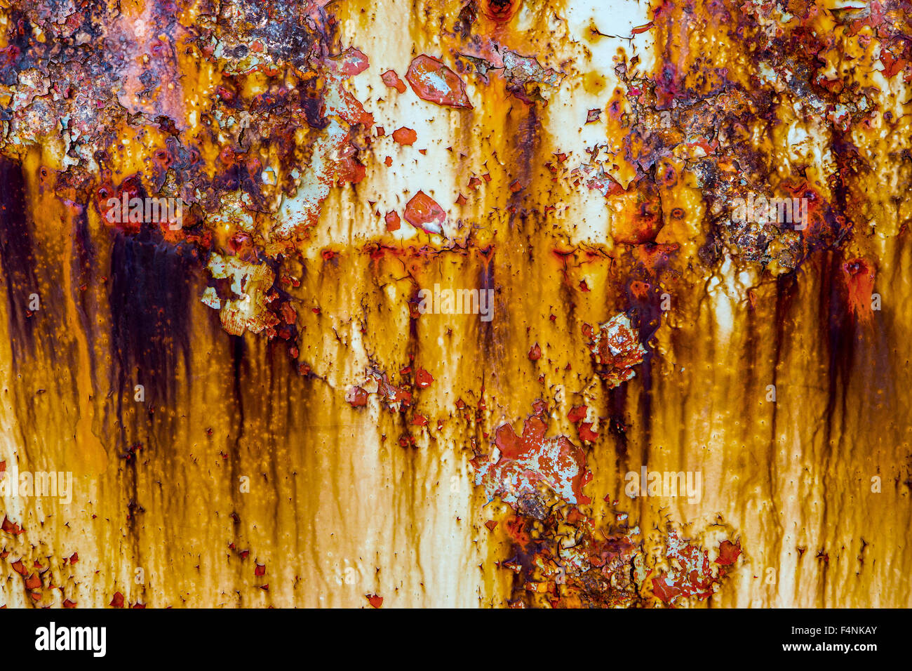 Flaking paint and rust on metal. Stock Photo