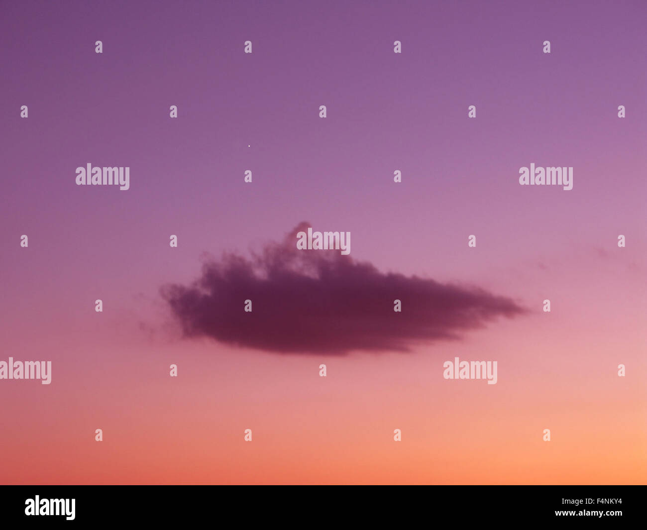 Purple cloud on pink sky with small star, dream, wishing or hope