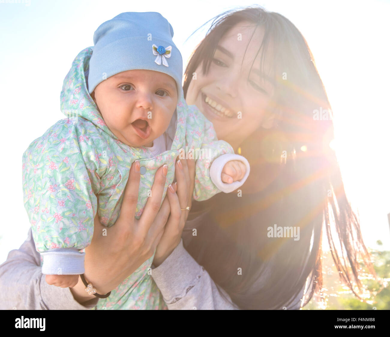 Mother and baby with backlight Stock Photo