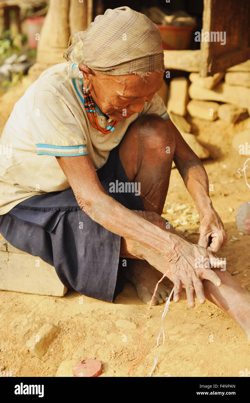 Nagaland, India - March 2012: Old woman in Nagaland, remote region of India. Documentary editorial. Stock Photo