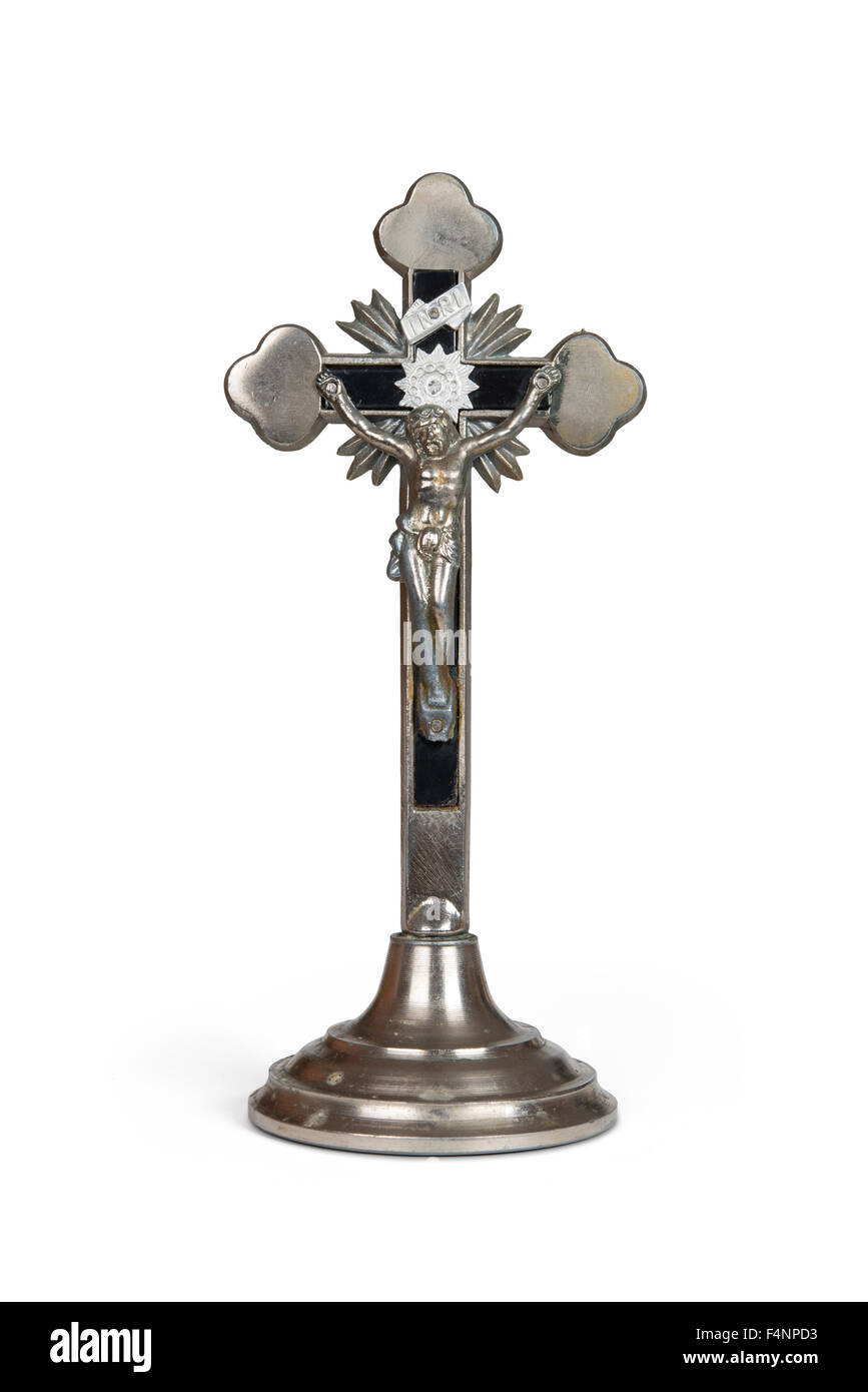 Crucifix with figure of Jesus isolated over white with clipping path. Stock Photo
