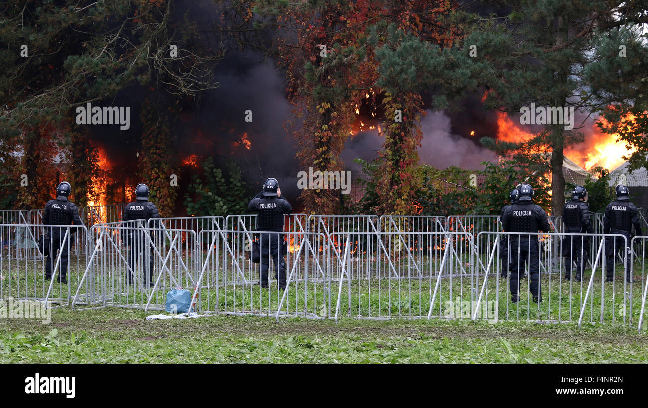 Brezice, Slovenia. 21st Oct, 2015. Slovenia is coping with the large influx of refugees from Siria, Afganistan, Iraq,... On the border with Croatia, in small town Brežice, camp was build to register and transfer refugees. Becouse they weren't happy with situation the set afire the tents. Firefighters were able to put out the fire and police to calm the situation, but almost half of the tens burned out. Credit:  Mitja Mladkovic/Alamy Live News Stock Photo