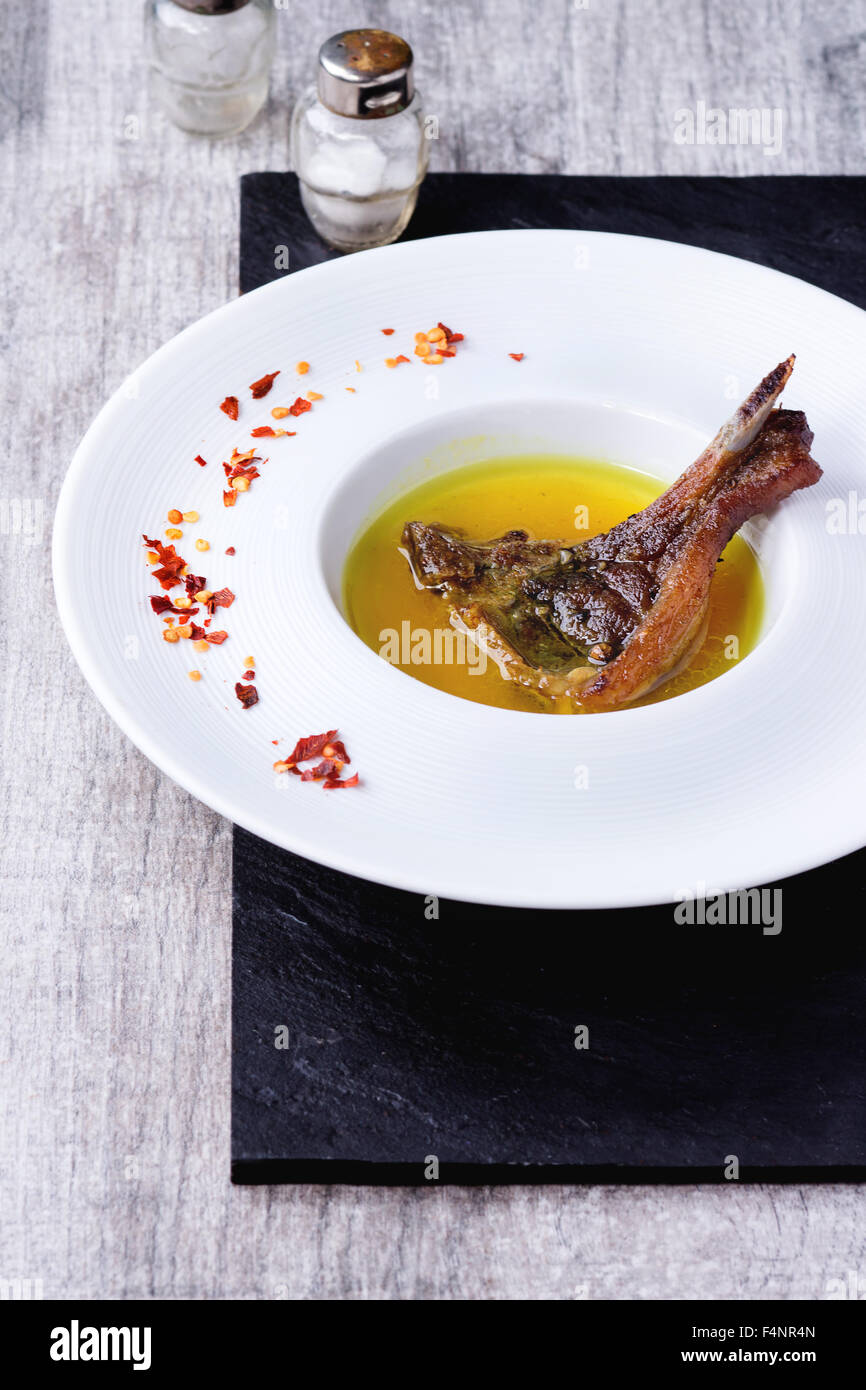 Well done grilled lamb chop Stock Photo Alamy