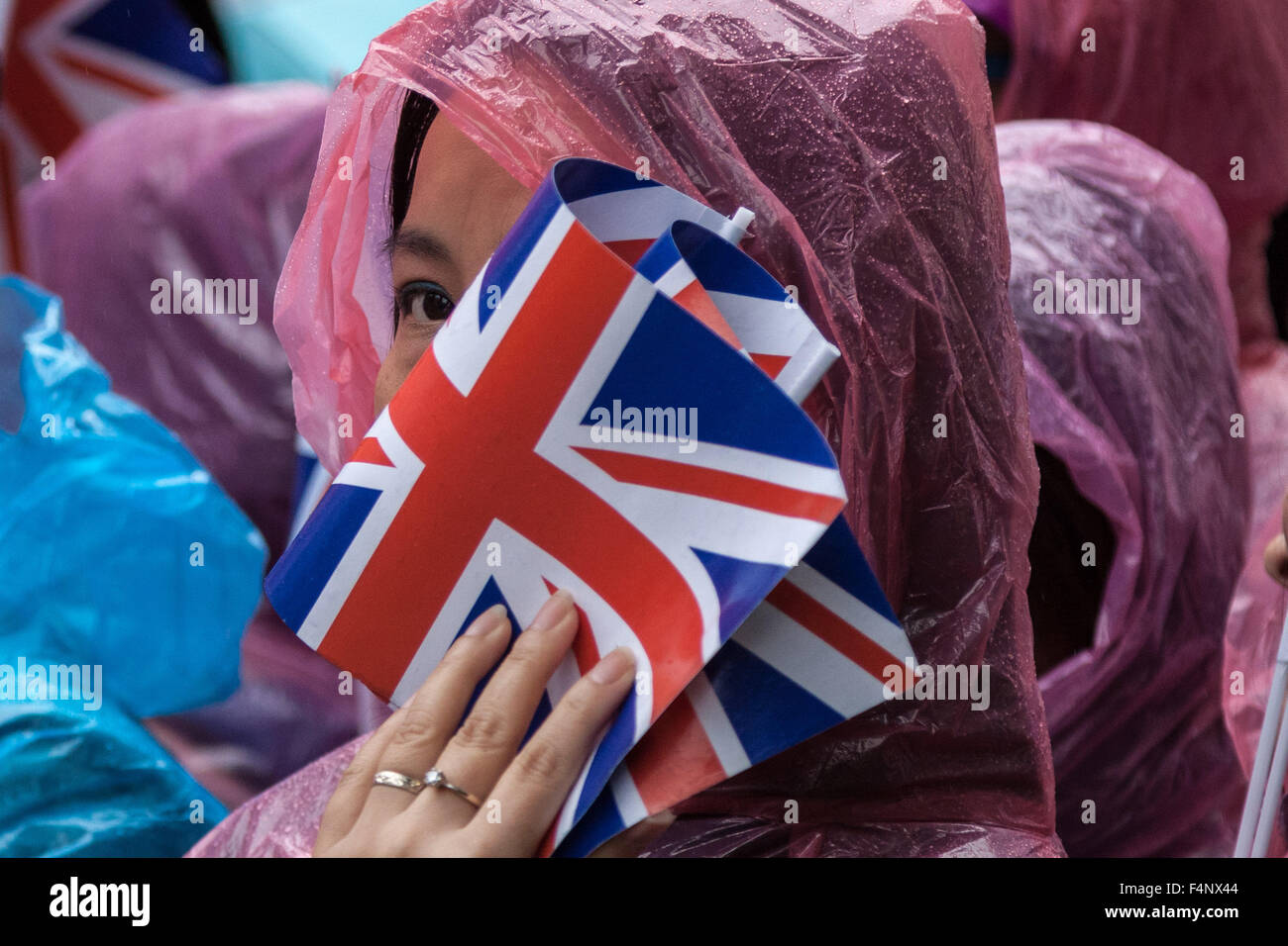 London, UK. 21st October, 2015. Pro-Chinese government supporters wait for President Xi Jinping to  arrive at Downing Street on day two of his official state visit in UK Credit:  Guy Corbishley/Alamy Live News Stock Photo
