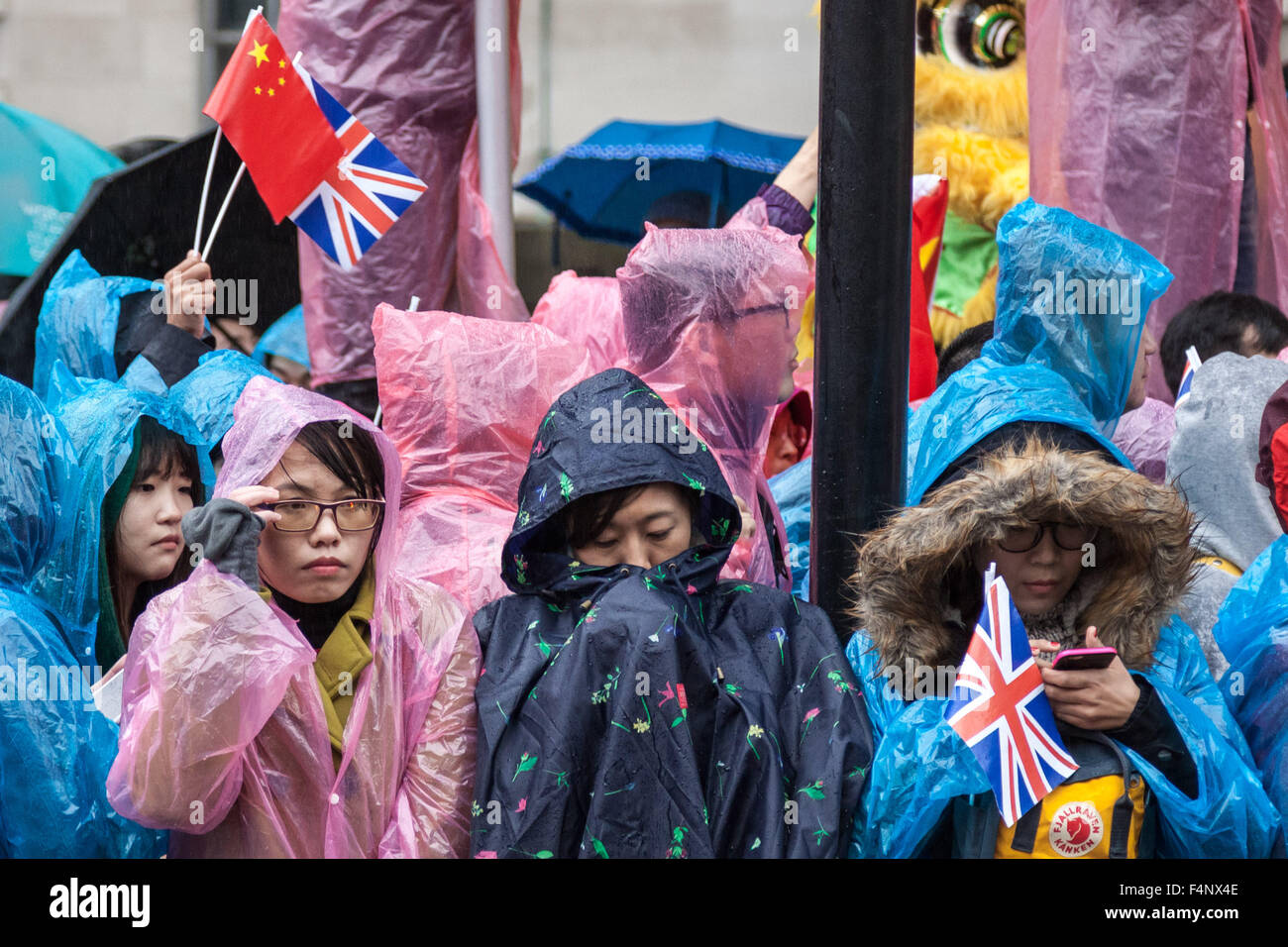London, UK. 21st October, 2015. Pro-Chinese government supporters wait for President Xi Jinping to arrive at Downing Street on day two of his official state visit in UK Credit:  Guy Corbishley/Alamy Live News Stock Photo