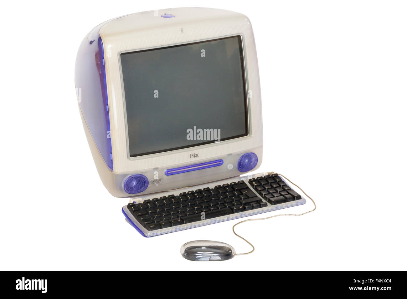 Original / old Apple iMac personal desk top computer Power PC G3 model with CRT type screen, late 1990's model running Mac OS 9. Stock Photo