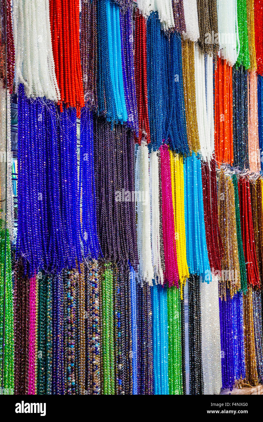 Strings of sparkly beads in the Khan el-Khalili souk in Cairo. Stock Photo