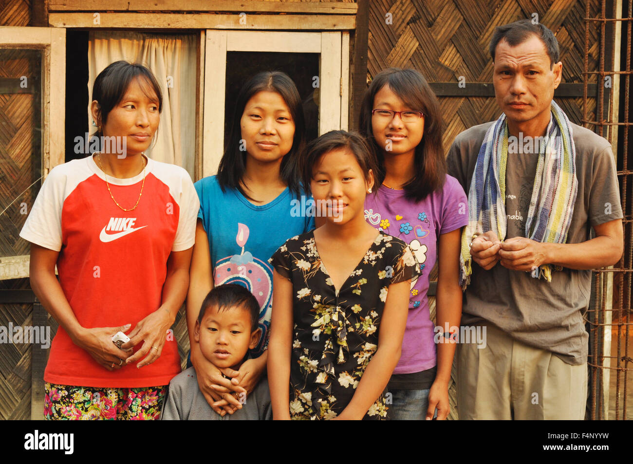 Nagaland, India - March 2012: Portrait of family in Nagaland, remote region of India. Documentary editorial. Stock Photo