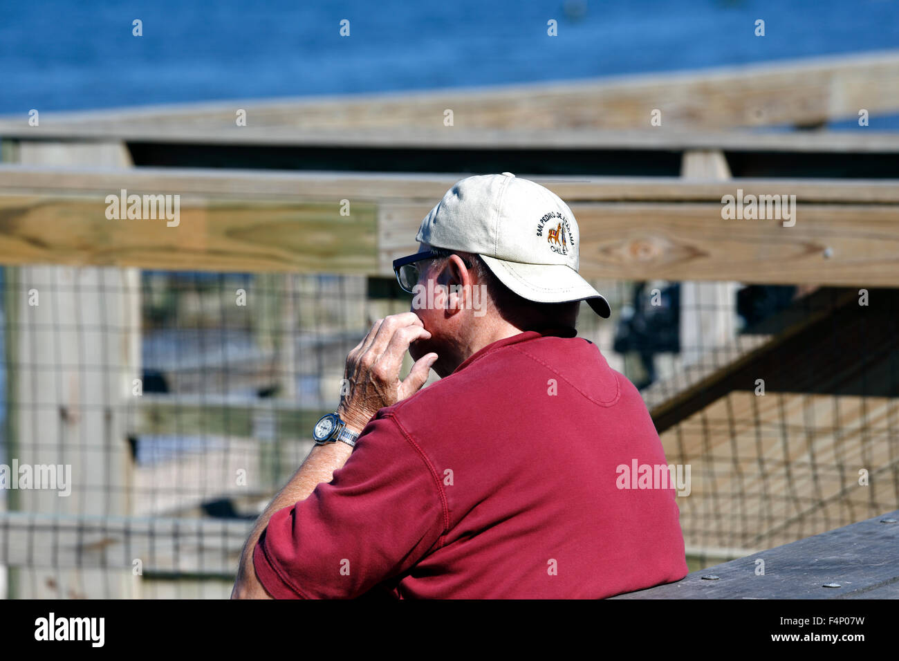 Man scratching face Long Island New York Stock Photo