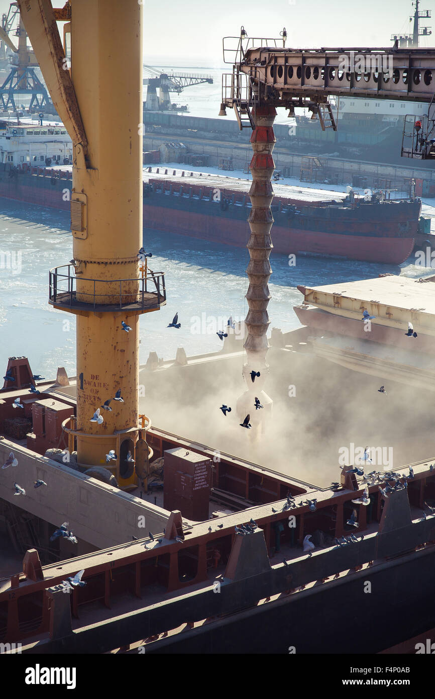 Loading grain in the granary on the ship. Mariupol, Ukraine Stock Photo
